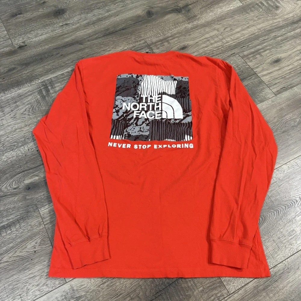 The North Face Shirt Mens Medium Orange Long Sleeve Graphic Circular Design